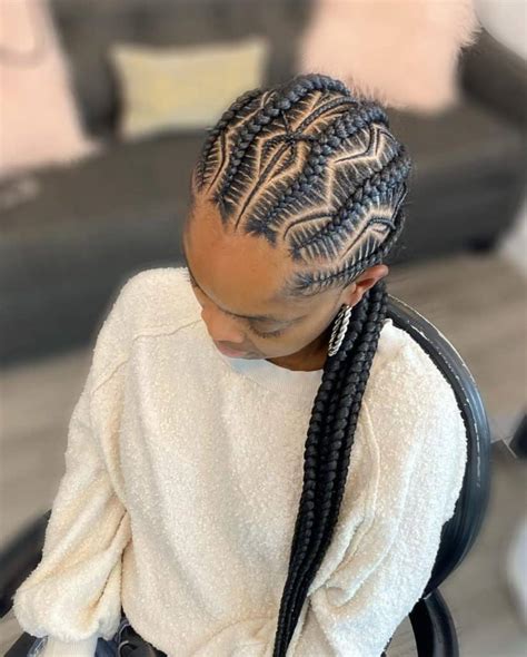 The zig-zag Cornrow from the temple to the back of the head creates a distinct and uncommon appearance. . Zig zag cornrows